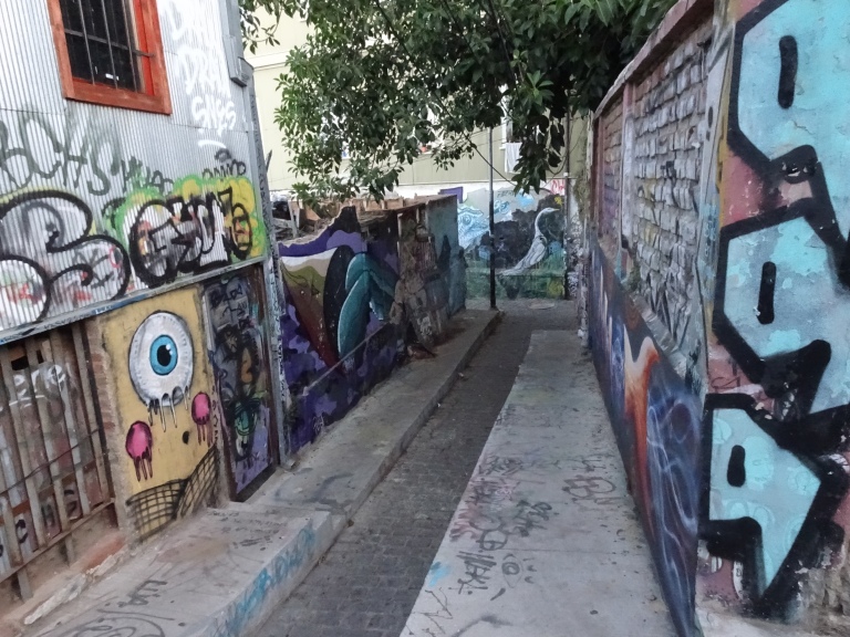 As I explored, I discovered small walkways/streets such as this one with walls covered in artsy graffiti and interesting stores to find along the way.