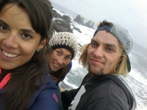 Vivi, our pololo, and I watching the amazing surfers below in the crashing waves.