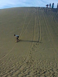 Me - standing to sandboard down the hill